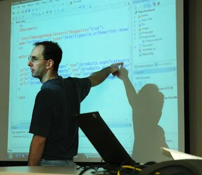 man in black crew neck t-shirt using black laptop computer